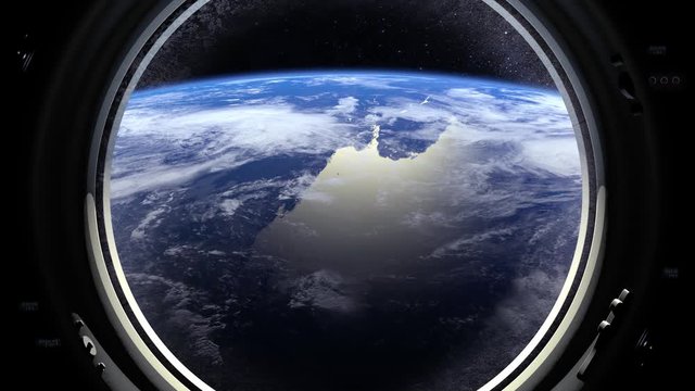 The spaceship is approaching the earth. Earth in the porthole window is approaching. Realistic atmosphere. 3D Volumetric clouds. Space.