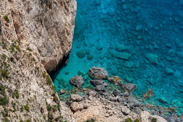 Obraz premium View to the crystal clear blue sea from the cliffs in the southwest of Zakynthos, near Keri