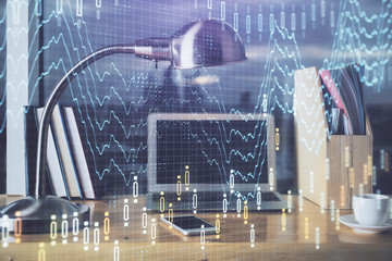 Forex market graph hologram and personal computer on background. Double exposure. Concept of investment.