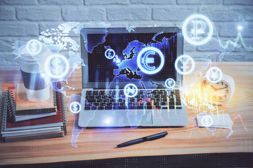 Fototapeta premium Double exposure of graph and financial info and work space with computer background. Concept of international online trading.