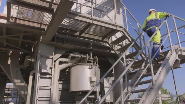 Engineers at outside factory area