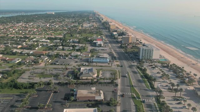 Aerial over Hotels, condominiums & residential houses on Ormond Beach. Florida, USA
