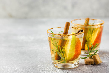 Spiced pear cider with rosemary and cinnamon. Selective focus, copy space.