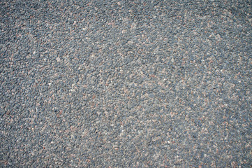 Asphalt texture close up. Stones road surface.