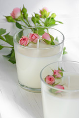 Сandle making - Handmade soy wax candle in glass on white background. Front view. Healthy lifestyle concept
