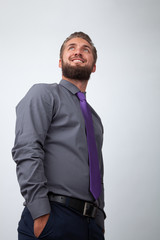 Portrait of a bearded businessman isolated on a white background