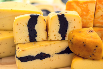 Different kinds of cheese at cheese festival. Organic and farm food