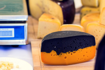 Different kinds of cheese at cheese festival. Organic and farm food