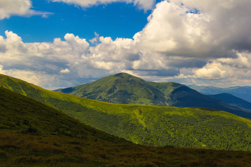 Summer landscape in the Carpathian mountains. View of the mountain peak Hoverla.