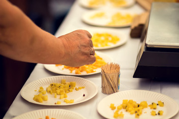 Custumers taste different kinds of cheese at cheese festival. Organic and farm food