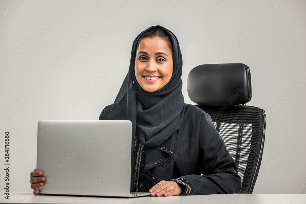 Wall mural arabian woman isolated on background