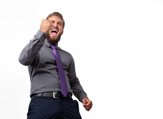 Fototapeta premium Portrait of an attractive businessman who is celebrating his success isolated on a white background. Copy space