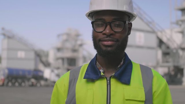 Site manager portrait smiling outdoors