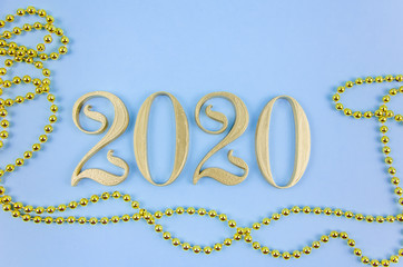 New Year 2020. Golden numbers on a blue background