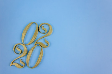 New Year 2020. Golden numbers on a blue background