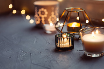 Hygge concept with candles and festive on the windowsill