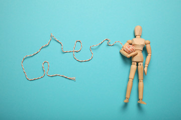 Figure of person with tangle of problems, solving difficulties.