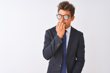 Young handsome businessman wearing suit and glasses over isolated white background looking stressed and nervous with hands on mouth biting nails. Anxiety problem.
