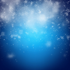 Christmas template with white blurred and clear snowflakes on blue background. EPS 10