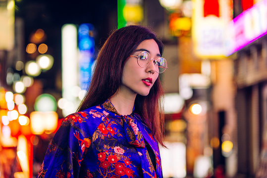 Pretty asian woman portrait with led lights