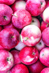 Fresh ripe red apples as background