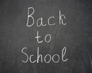 back to school written on a blackboard