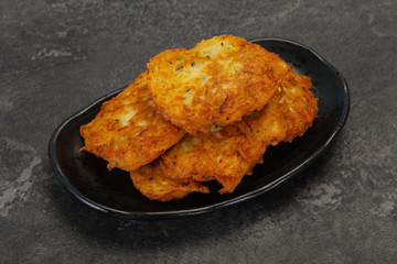 Roasted potato pancakes in the bowl