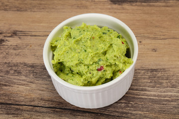 Avocado guacamole sauce with chili pepper