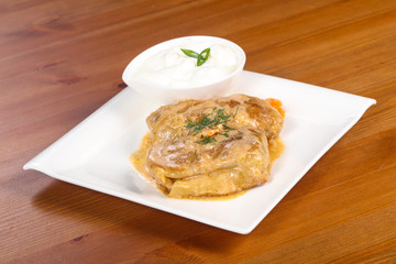 Homemade stuffed cabbage with cream