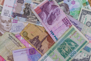 Multicurrency background of US dollars, Russian rubles, Belarusian rubles, Egyptian pounds and Ukrainian hryvnias