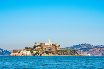 Fototapeta na wymiar Alcatraz Prison Island in San Francisco Bay, offshore from San Francisco, California, a small island with military fortification and federal prison, now a famous national historical landmark.