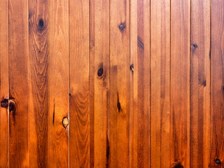 Wooden lining. Shield of wooden boards. Boards are treated with stain.