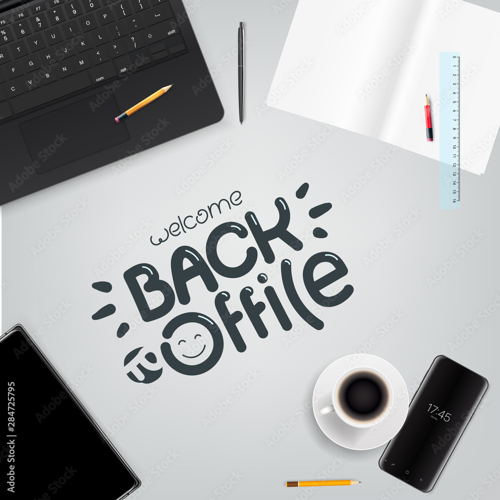 Aufkleber welcome back to office. different business stuff on a table. top view