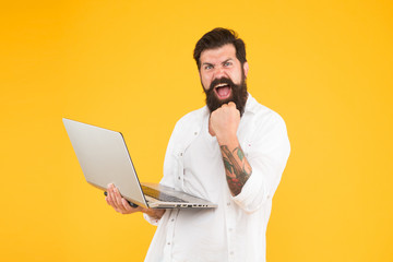 Successful developer. Bearded man with notebook. Online shopping. Man using notebook. Digital...