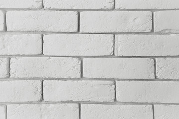 Modern white brick wall texture as a background. Abstract backdrop