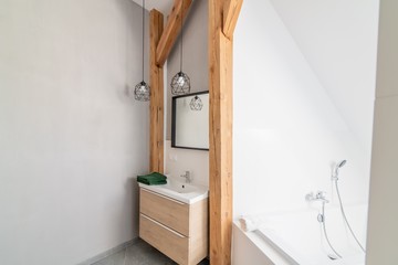 Modern loft bathroom with mirror in loft apartment