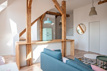 Bright attic kitchen in apartment.