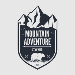 Mountain Adventure vintage label, badge, logo or emblem. Vector illustration.