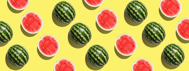 Pattern with ripe watermelon on yellow background. Pop art design, creative summer concept