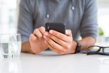 Close up of man using smartphone