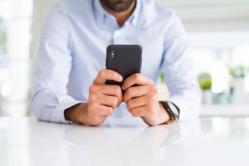 Close up of man using smartphone
