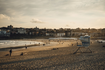 Bondi Beach, New South Wales - AUGUST 4th, 2019: Sunset over Bondi beach on a cold winter afternoon.