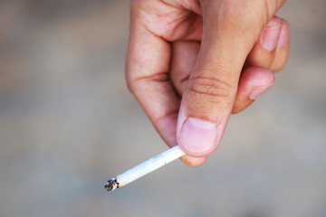 man holding a cigarette