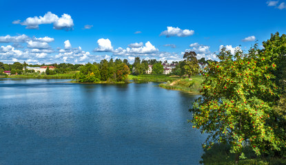 Beautiful summer landscape with a cliff by the lake