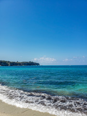 Summer, beach and a turquoise sea.