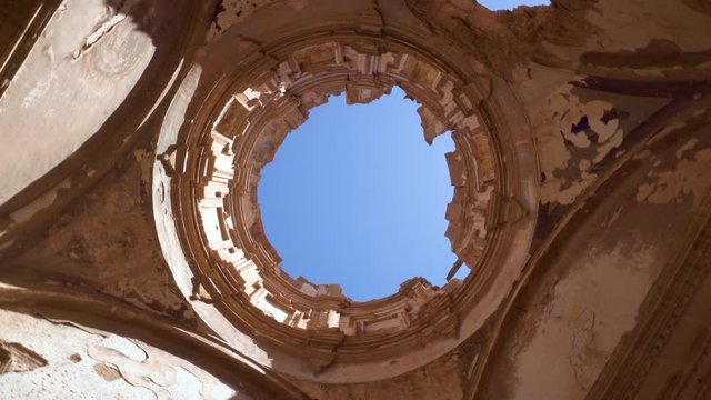 Rotating view of ceiling ruins of a destroyed church in the ancient village of Belchite. Spanish village destroyed during the Spanish civil war .
