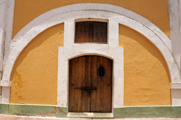 Colorful doorway entrance with architectural design and style