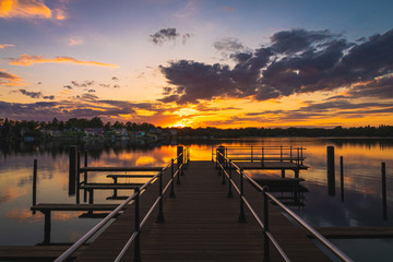 Naklejka na ściany i meble Tranquil sunset landscape on the lake