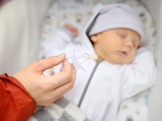 Obraz na płótnie Canvas Closeup portrait of sweet newborn baby