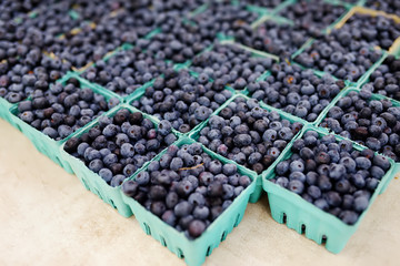 Fresh assorted berries at farmers market. Blueberries